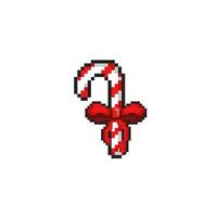 candy cane with red ribbon in pixel art style vector