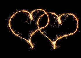 two hearts made with sparklers photo
