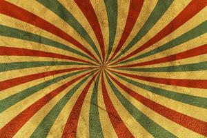 Vintage paper background with rays or stripes in the center. Solar multi-colored rays with spots. Circus poster. photo