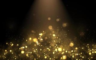 Sparkling dust particles. Glittering golden dust. Abstract background with bokeh effect. photo