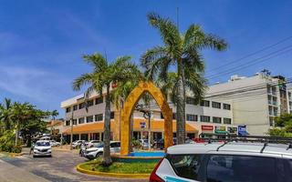 Playa del Carmen Quintana Roo Mexico 2022 Street with traffic circle and tropical palms Playa del Carmen. photo