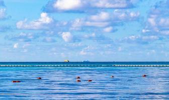 Boats yachts ship jetty beach in Playa del Carmen Mexico. photo