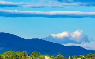 Mountain panorama cliffs rocks hilly tropical landscape Puerto Escondido Mexico. photo