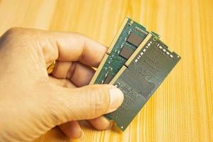 top view ddr4 ram holding in hand photo