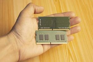 top view ddr4 ram holding in hand photo