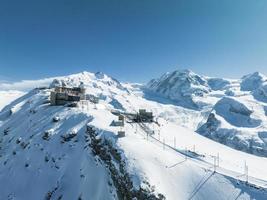 Aerial panorama view of the luxury hotel and the astronomic observatory at the Gornergrat photo