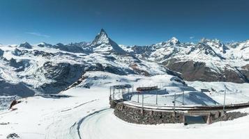 Zermatt, Switzerland -The train of Gonergratbahn running to the Gornergrat station photo