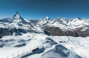 Zermatt, Switzerland -The train of Gonergratbahn running to the Gornergrat station photo