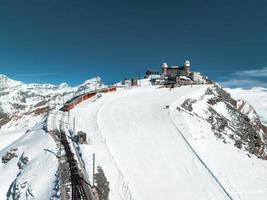 Zermatt, Switzerland -The train of Gonergratbahn running to the Gornergrat station photo