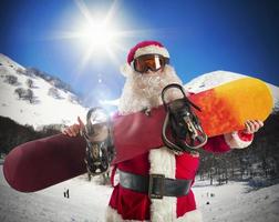 Santa Claus with snowboard photo