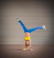 Acrobat woman having fun photo