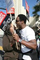 Shonda Rhimes  Isaiah WashingtonActors Support WGA Strike Paramount StudiosDecember 12 2007Los Angeles CA2007 photo