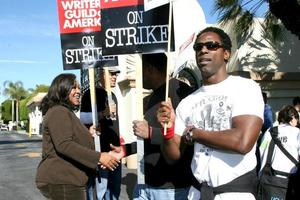 Shonda Rhimes  Isaiah WashingtonActors Support WGA Strike Paramount StudiosDecember 12 2007Los Angeles CA2007 photo