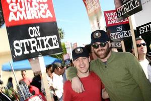 TR Knight  Paul AdelsteinActors Support WGA Strike Paramount StudiosDecember 12 2007Los Angeles CA2007 photo