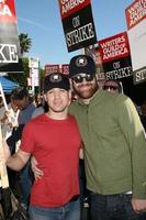 TR Knight  Paul AdelsteinActors Support WGA Strike Paramount StudiosDecember 12 2007Los Angeles CA2007 photo