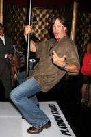 Kevin Sorbo demonstrating his moves on the Platinum Stages stripper poleGBK MTV Movie Awards Gifting Suites Crimson  OperaLos Angeles  CAMay 30 20082008 photo