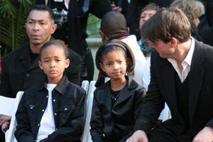 Tom Cruise with Wills friends and familyincluding Jaden  Willow Will  Jadas KidsWill Smith Handprint and Footprint Ceremony Graumans Chinese Theater ForecourtDecember 10 2007Los Angeles CA2007 photo