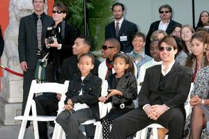 Tom Cruise with Wills friends and familyincluding Jaden  Willow Will  Jadas KidsWill Smith Handprint and Footprint Ceremony Graumans Chinese Theater ForecourtDecember 10 2007Los Angeles CA2007 photo