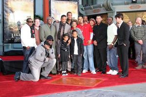 Will Smith with his family  Friends  and Tom CruiseWill Smith Handprint and Footprint Ceremony Graumans Chinese Theater ForecourtDecember 10 2007Los Angeles CA2007 photo