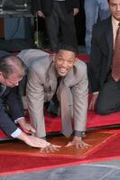 Will SmithWill Smith Handprint and Footprint Ceremony Graumans Chinese Theater ForecourtDecember 10 2007Los Angeles CA2007 photo