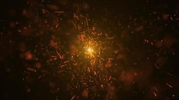 gloeiend rood heet vonken emitting en exploderend van een pyrotechnisch sterretje. vol hd vuurwerk beweging achtergrond animatie. video