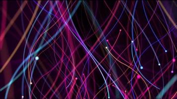 vibrante multicolorido brilhante, fluindo colorida partículas e movimento trilhas. hd e looping abstrato movimento fundo animação. video