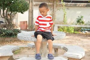 boy playing on the table photo