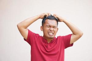 Men have itchy scalp from dandruff. photo
