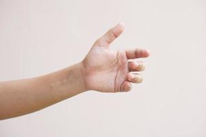 Asian woman making hands like holding an empty bottle photo