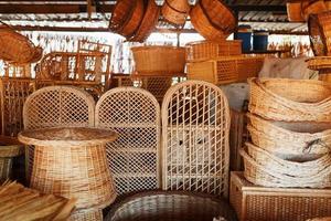 Handmade wicker furniture, products and souvenirs at the street craft market. photo