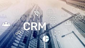 CRM, Customer relationship management system concept on abstract blurred background. photo