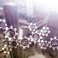 Automation technology and smart industry concept on blurred abstract background. Gears and icons. photo