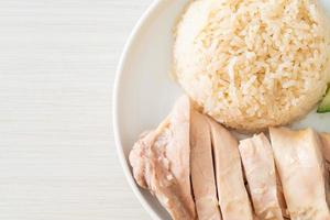 Hainanese chicken rice or rice steamed with chicken soup photo