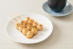 Mitarashi dango. Dumpling in a sweet soy sauce photo