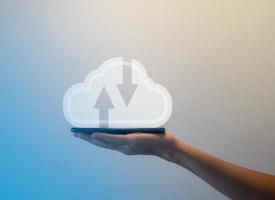 cloud computing concept, hand holding virtual cloud icon, cloud technology big data storage on smartphone photo