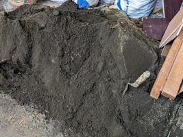 A close up of pile of sands for concrete cement mix or mortar.  For construction background or wallpaper. No people photo