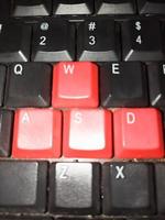 old mechanical keyboard with red buttion photo