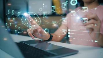 Hand touching brain of AI, Symbolic, Machine learning, artificial intelligence of futuristic technology. AI network of brain on business analysis, photo