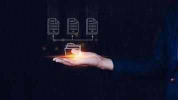 Document Management System DMS, Online documentation database and process automation to efficiently manage files, knowledge and documentation enterprise with ERP. Corporate business technology. photo