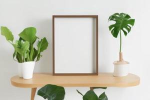 frame with leaves on table photo