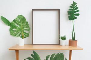 frame with leaves on table photo