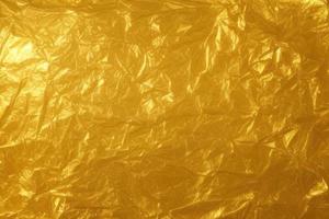 gold crumpled paper texture photo