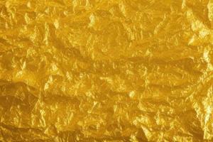 gold crumpled paper texture photo