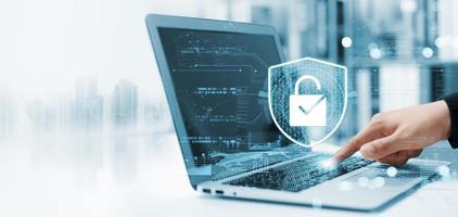 Cybersecurity privacy of data protection, businessman using laptop Secure encryption technology, security Internet access, security encryption of user private data, business confidentiality. photo