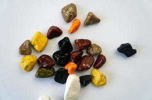 colorful chocolate stones by hajj or umrah isolated on white background photo