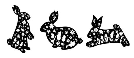 Floral Easter Bunny Silhouette set. Happy Easter vector black rabbits shape collection. Farmhouse animal design. Cartoon folk bunny Happy Easter party. Easter party elements isolated illustrations.