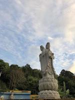 Solemn Buddha statue in Penang, Malaysia photo