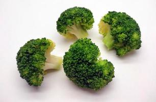 Broccoli collection. Different sides of green fresh broccoli.  Isolated on white background photo