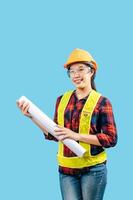 Young female engineer wearing yellow helmet hold blueprint posture photo