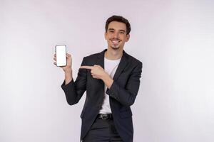 Portrait of young businessman holding smartphone cellphone blank screen with mockup copy space isolated white background photo